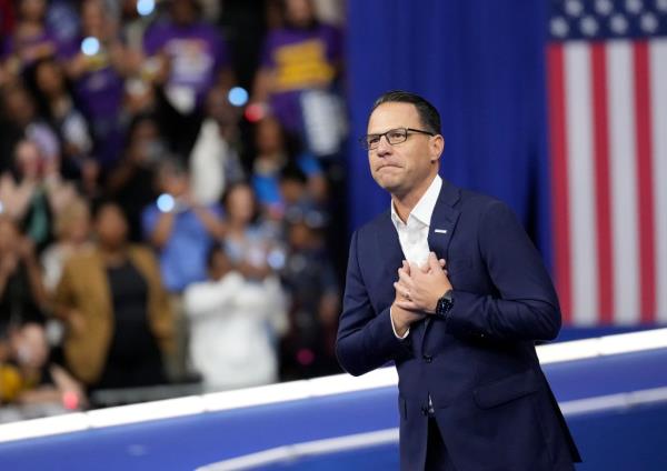 Democratic presidential nominee Vice President Kamala Harris and her running mate Minnesota Gov. Tim Walz arrive for a campaign rally in Philadelphia, Tuesday, Aug. 6, 2024.