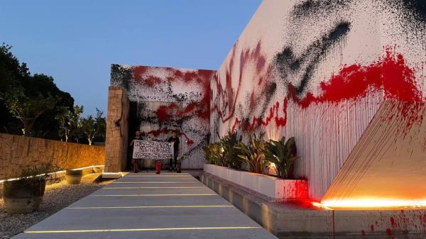 Lio<em></em>nel Messi's Ibiza mansion was vandalized by climate activists from Futuro Vegetal, who splashed red and white paint on the property and posed with a flag.