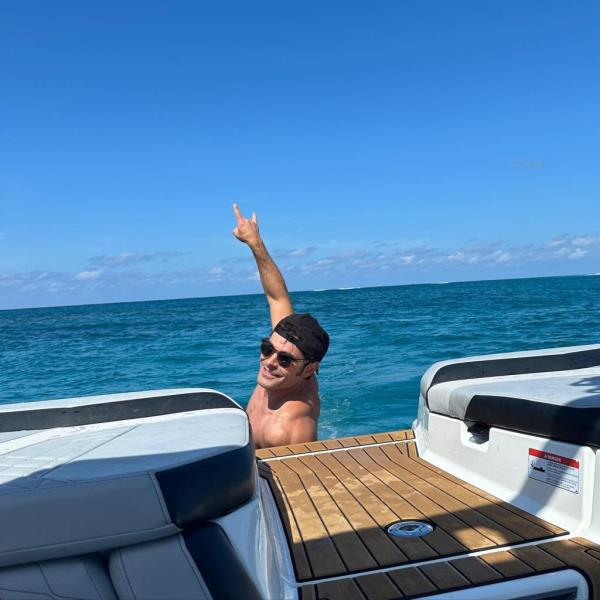 Zac Efron on a boat.