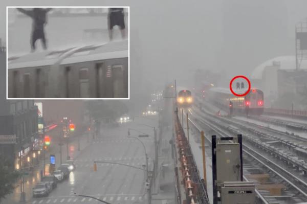 视频显示，地铁冲浪白痴在纽约暴雨中坐在火车顶上