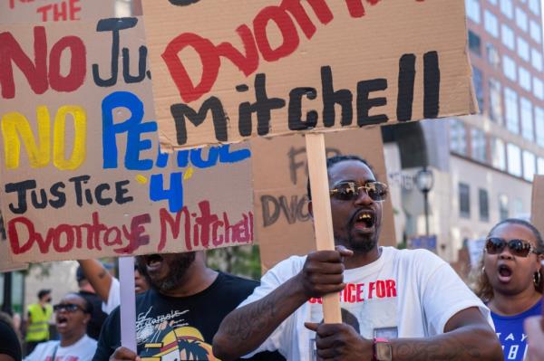 Protesters call for justice for D'Vo<em></em>ntaye Mitchell and Samuel Sharpe during a march through the streets as the RNC co<em></em>ntinues on July 18, 2024 in Milwaukee, Wisconsin.