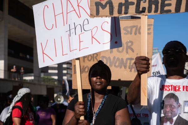 Protesters call for justice for D'Vo<em></em>ntaye Mitchell and Samuel Sharpe during a march through the streets as the RNC co<em></em>ntinues on July 18, 2024 in Milwaukee, Wisconsin.