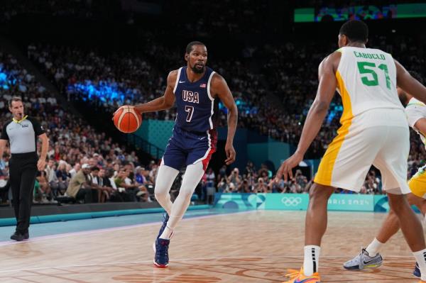 Kevin Durant #7 of Team USA dribbles the ball during the game against Team Brazil