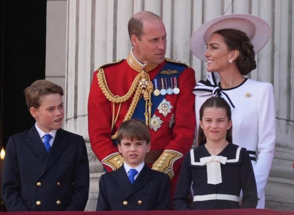 The Prince and Princess of Wales with their children, Prince George, Prince Louis, and Princess Charlotte, on the balcony of Buckingham Palace, London, to view the flypast following the Trooping the Colour ceremony in central London, as King Charles celebrates his official birthday on June 15, 2024.