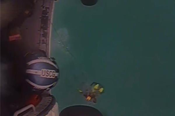 An Air Station Clearwater Jayhawk helicopter rescue crew was able to rescue the stranded boaters.