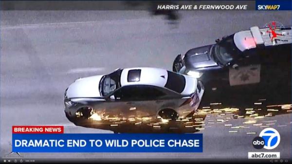 The cruiser nudges the back of a fleeing car. 