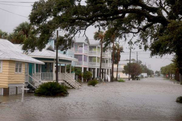 High winds, rain and storm surge from Hurricane Debby inundate a neighborhood on August 05, 2024 in Cedar Key, Florida