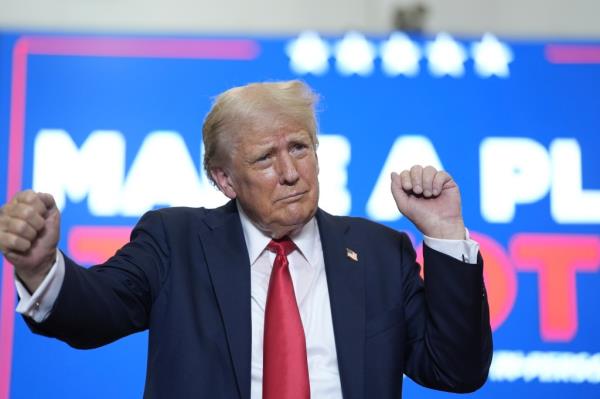 Former President Do<em></em>nald Trump dancing at a 2024 campaign rally in St. Cloud, Minn.