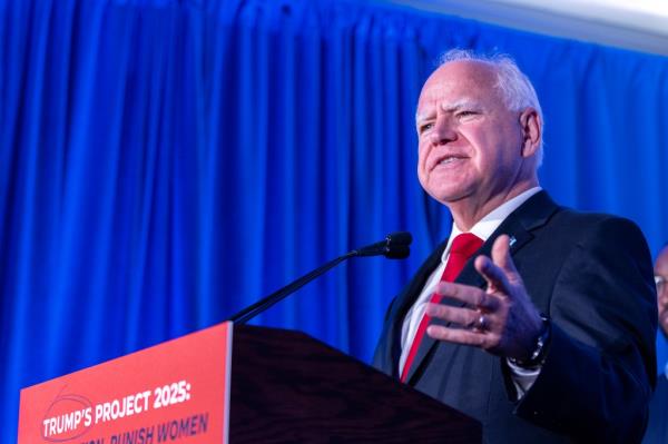 Minnesota Governor Tim Walz speaking at a Biden-Harris campaign and DNC press co<em></em>nference in Milwaukee, Wisconsin, addressing Project 2025 and Republican policies on abortion.