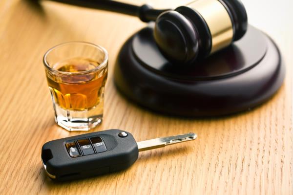 A gavel, a car key and a shot of whisky.