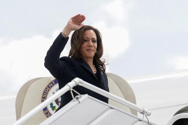 U.S. Vice President Kamala Harris waving goodbye from the plane, preparing to depart Houston, Texas on August 1, 2024.