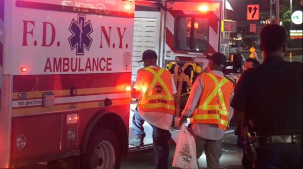 Herring boarding an ambulance after the stabbing hoax.