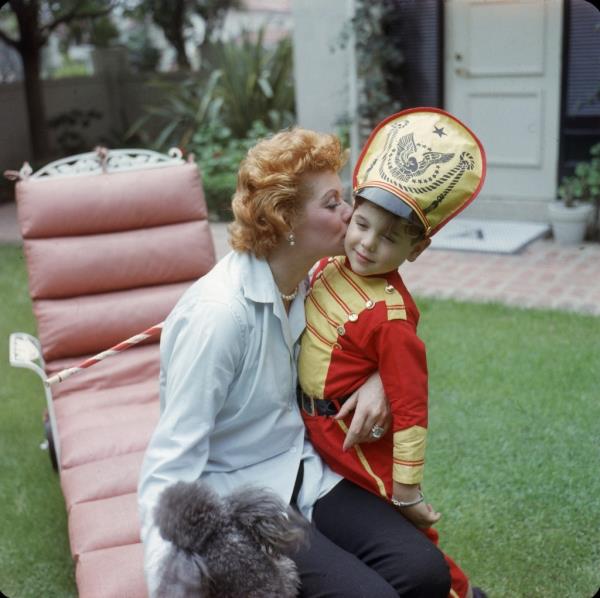 Lucille Ball kissing her son. 