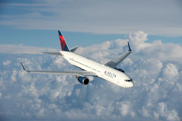 A Delta plane (not pictured) flying over the Atlantic Ocean was forced to quickly turn around and retreat back to Boston following a lightning strike Sunday, the airline and the FAA said.