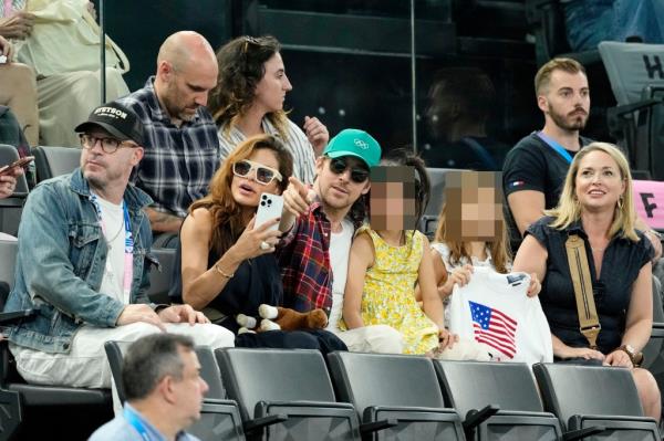 Eva Mendes and Ryan Gosling at the Paris Olympics