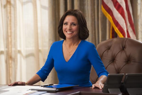 Julia Louis-Dreyfus in a blue dress in a scene from Veep, season 5 episode 2, photo by Lacey Terrell