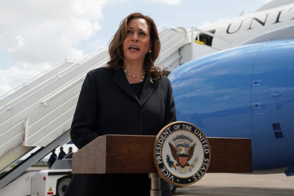 Kamala Harris speaks on a tarmac in Houston following Russia's release of American hostages.