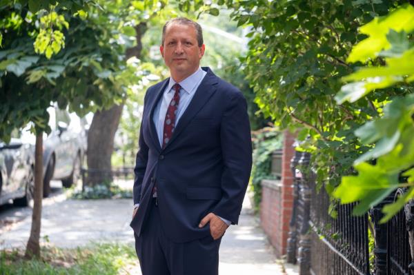 Brad Lander outside of his home in Park Slope.