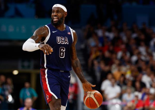 LeBron James dribbles during Team USA's win over Puerto Rico on Aug. 3, 2024.