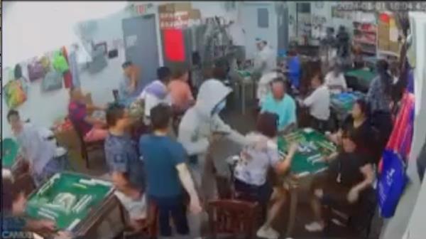 Surveillance footage allegedly shows Joshua Dorsett during an armed robbery inside a mahjong parlor on Thursday.