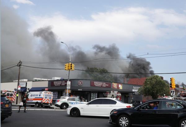 Smoke coming out of buildings on Francis Lewis Blvd. in Queens.