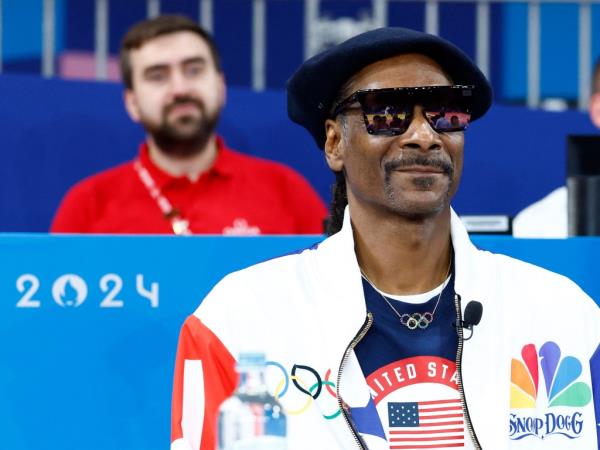 Snoop Dogg is seen during the bout between Peter Paltchik of Israel and Michael Korrel of Netherlands at a Men's Judo event.