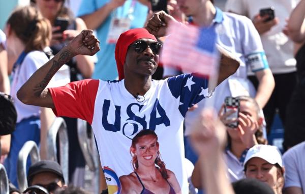 Snoop Dogg at the Paris 2024 Olympics Beach Volleyball women's match between the United States and France.