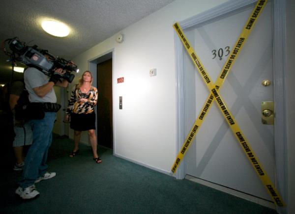 The media stand outside the apartment wher<em></em>e fugitive crime boss James "Whitey" Bulger on June 23, 2011.