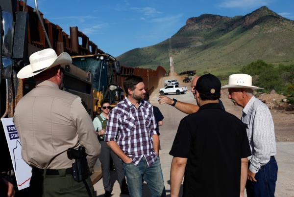 Republican vice presidential nominee U.S. Sen. JD Vance talks with Sheriff Robert Watkins of Cochise County (L), President of the Natio<em></em>nal Border Patrol Council Paul A. Perez and rancher John Ladd  while touring the U.S. Border Wall on August 01, 2024 in in Mo<em></em>ntezuma Pass, Arizona. 