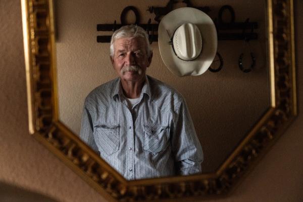 The owner of Laddas San Jose Ranch John Ladd poses in his house which is located at the U.S.-Mexico border in  Hereford, Arizona on August 1, 2024