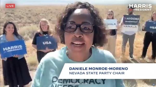 Daniele Monroe-Moreno, Nevada state party chair showed support for Harris with others around her with harris posters