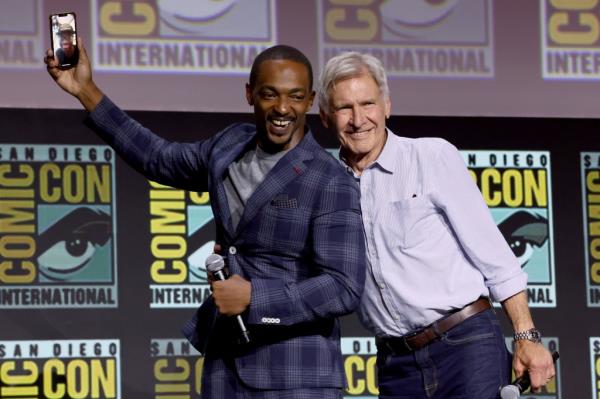 Director Julius o<em></em>nah (seen via cell phone), and actors Anthony Mackie and Harrison Ford.