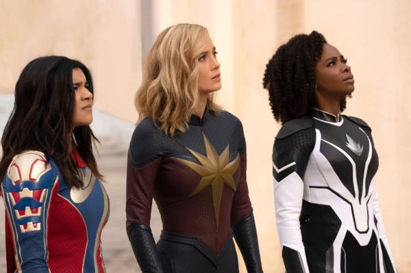 Iman Vellani as Ms. Marvel, Brie Larson as Captain Marvel, Teyo<em></em>nah Parris as Captain Mo<em></em>nica Rambeau in "The Marvels" (2023).