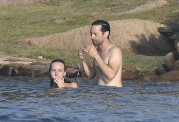 The pair cooled down in the crystal-clear water.