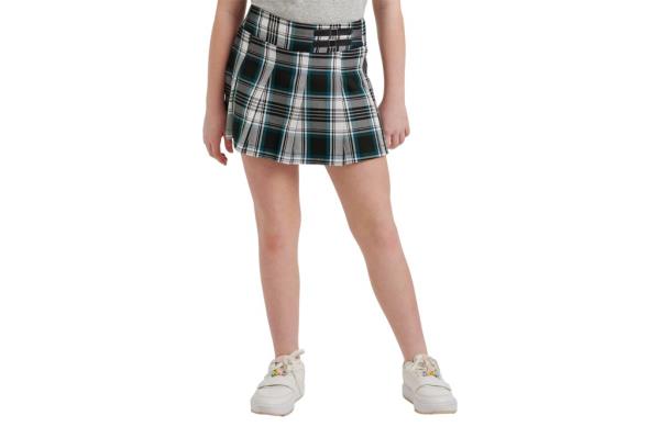 A person wearing a plaid skirt