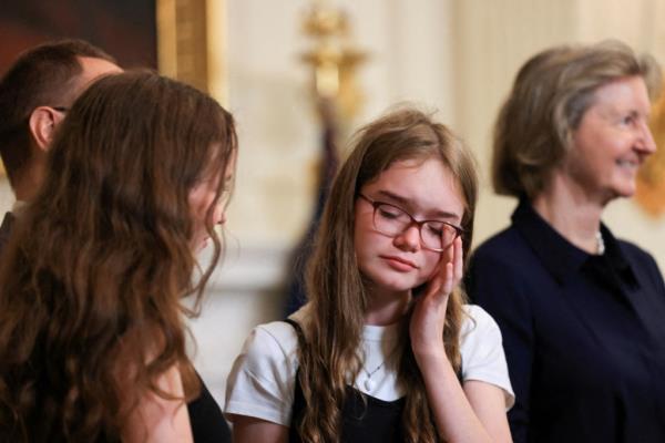 Miriam Butorin, daughter of Alsu Kurmasheva, reacts during an event wher<em></em>e U.S. President Joe Biden speaks a<em></em>bout the release of Paul Whelan, Evan Gershkovich, Alsu Kurmasheva, and Vladimir Kara-Murza, who were detained in Russia, at the White House in Washington, U.S., August 1, 2024.