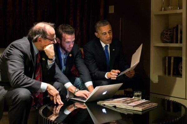 Favreau (seen center in 2012 with then-President Barack Obama and adviser David Axelrod) is a co-founder of Crooked Media.