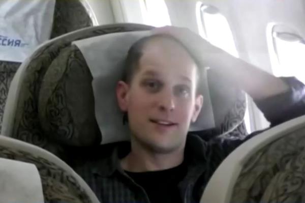 Evan Gershkovich on plane after being released in the priso<em></em>ner swap with Russia