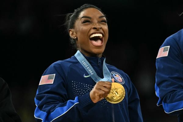 Simone Biles smiling. 