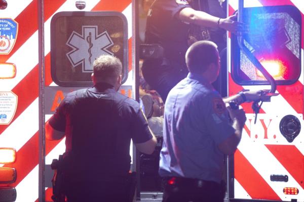 Police and EMS are seen at parking field 71 on Randall's Island in New York wher<em></em>e three people were shot, one fatally, on Monday, July 29, 2024.