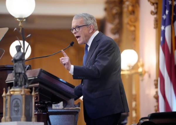 Ohio Governor Mike DeWine giving his 2024 State of the State address, showing a sample map drawn by a third party consultant, in the Ohio House chambers