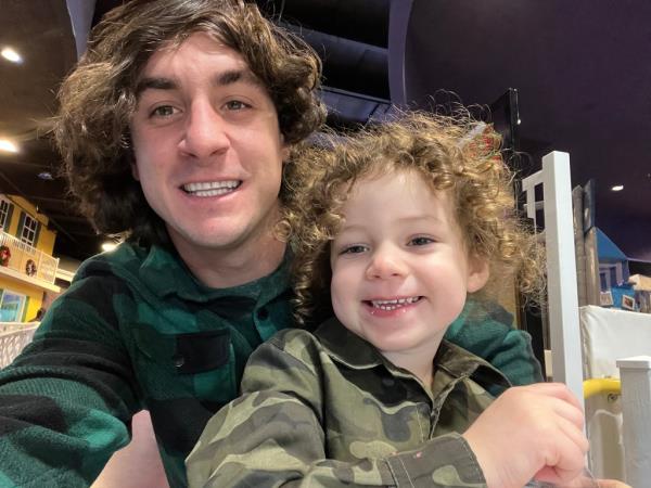 Harrison Tinsley taking a selfie with his son Sawyer after winning custody