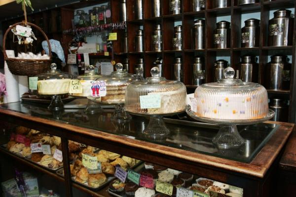 Display case filled with cakes and pastries at Alice's Tea Cup, a bakery located at 102 West 73rd Street in Manhattan.