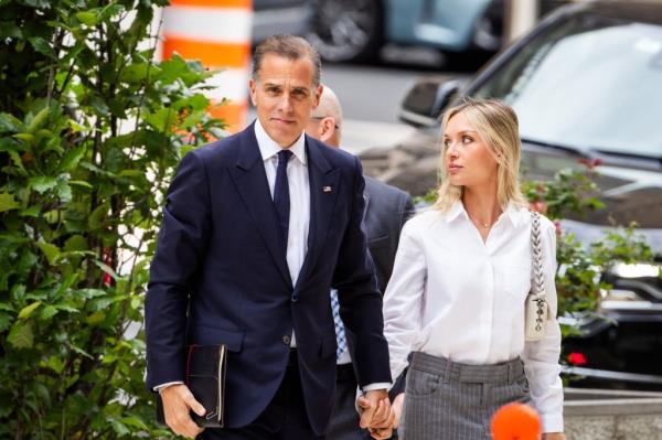 Hunter Biden and his wife walking into court.